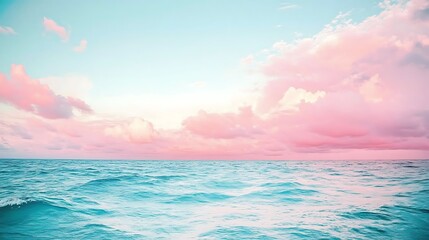 Obraz premium Pastel pink and turquoise ocean sunrise.