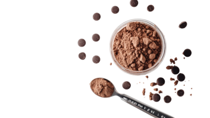 A close-up of cocoa powder in a clear container with chocolate chips scattered around, ideal for baking and cooking