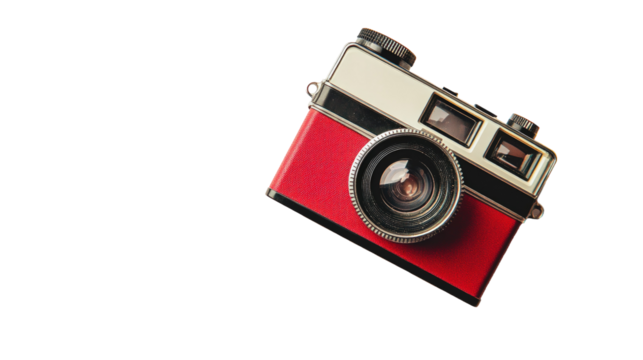 A vintage camera with a red and white design is captured against a plain background, symbolizing nostalgia and photography