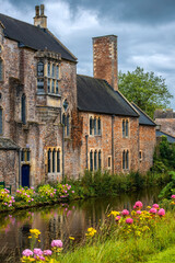 view of the Bishop's Palace from the gardens, Wells, Somerset, England, UK