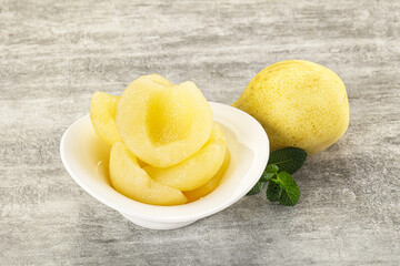 Canned yellow pear with syrup