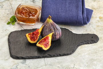 Purple ripe fig with cut
