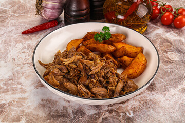 Baked shredded pork with potato