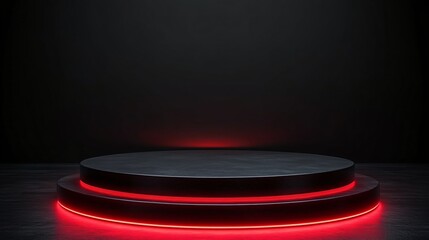Black circular podium with red neon lighting in dark room, futuristic display for product promotion or digital design showcase.