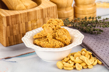 Crunchy peanut butter fat product