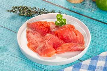 Delicous sliced salmon fillet  ready to eat