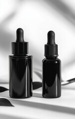Black Dropper Bottles Mockup for Cosmetic or Essential Oil Packaging Display