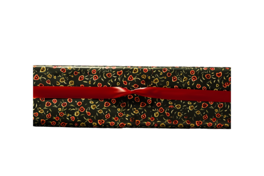 A gift-wrapping paper, with a red ribbon across the top and bott