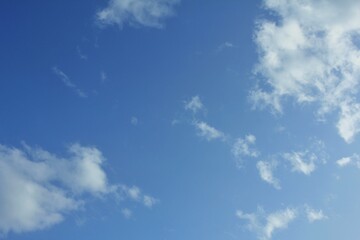 white clouds on a blue sky background. blue sky background.