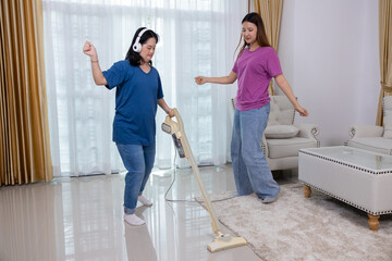 Disabled children, autism, vacuum the living room and enjoy listening to music