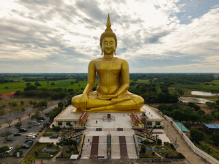 Golden Buddha statue in rural Thailand temple