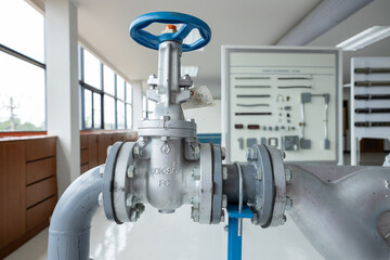 Assembly of water pumps, valves and industrial pipes in factories