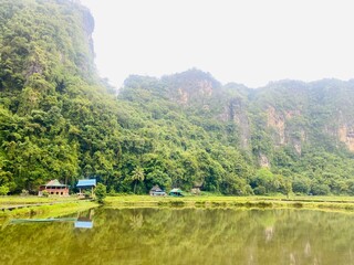 Obraz premium Karst mountain. Rammang Rammang Karst Mountain. landscape of Ramang-Ramang, a geological site, one of the biggest karst in the world. 