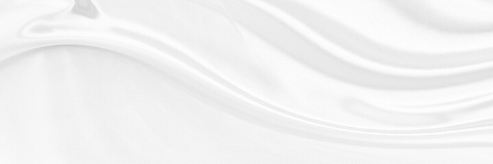 White gray satin texture that is white silver fabric silk panorama background with beautiful soft blur pattern natural.