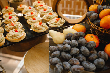 There is a beautifully arranged table overflowing with a variety of delicious food items and colorful fruit adorning its surface