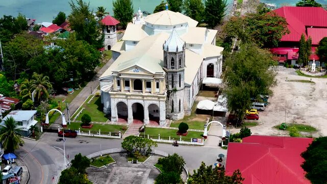Dauis Church of Our Lady of the Assumption in Panglao, Bohol island. Aerial 4K drone video footage of Philippines
