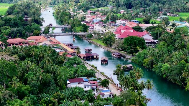 Loboc River cruise in Bohol island, Philippines. Aerial 4K drone video footage of river popular for river cruises 