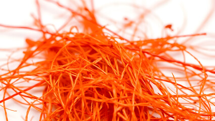 Fototapeta premium Close-up of Vibrant Red Saffron Threads, Natural Spice Pile