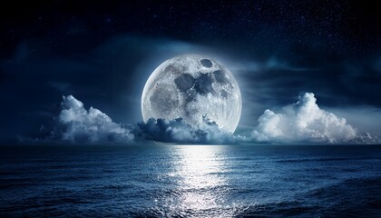 full moon in clouds over sea in night