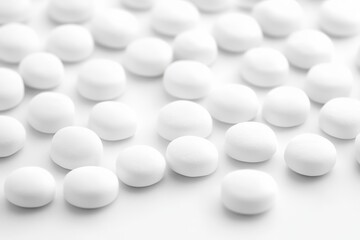 White pills scattered