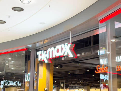 Bright tk maxx storefront with illuminated sign in modern shopping mall