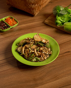 Karedok Traditional Indonesian Raw Vegetable Salad Served on a Plate with Fresh Lalapan and Spicy Sambal, Rich in Flavor and Full of Natural Goodness.