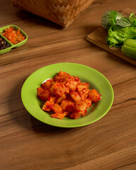 Spicy Potatoes with Fresh Vegetables and Sambal A Flavorful Balado Dish Packed with Heat and Texture.