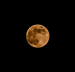 Full moon on the background of the night sky in spring