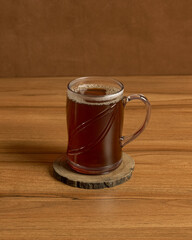 A Glass Of Hot Sweet Tea Served Steaming, Perfect For Relaxing Moments Or Pairing With Traditional Dishes In A Warm And Comforting Indonesian Setting.
