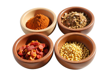 Four wooden bowls filled with various spices cinnamon powder, cumin, chili flakes