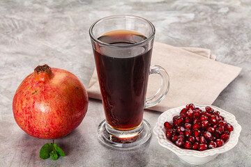 Sweet fresh pomegranate juice with fruit