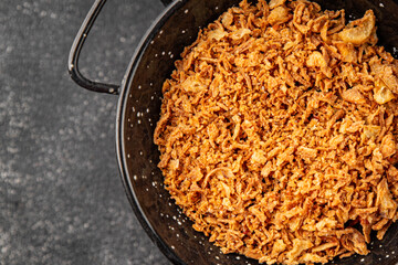 Oonion crispy fried onions vegetables dish fresh delicious gourmet food background on table rustic food top view copy space