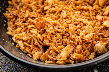 Oonion crispy fried onions vegetables dish fresh delicious gourmet food background on table rustic food top view copy space