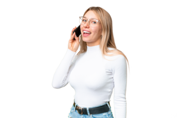 Young pretty blonde woman over isolated chroma key background keeping a conversation with the mobile phone