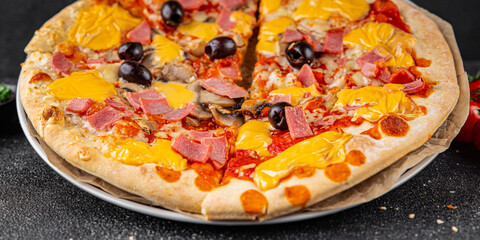 Pizza ham, mushrooms, olives, cheese appetizer vegetable dish fresh delicious gourmet food background on the table rustic food top view copy space