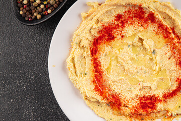 Hummus chickpea dip tasty appetizer vegetable dish fresh gourmet vegetarian and vegan food...