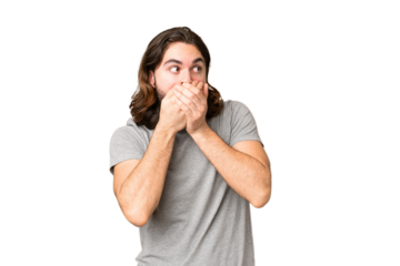 Young handsome man over isolated chroma key background covering mouth and looking to the side