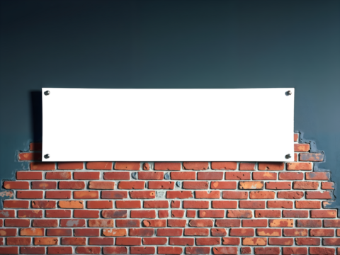 Transparent signboard on red brick wall with night lighting, suitable for advertisement or message.	