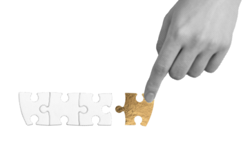 Hand placing the final golden puzzle piece, symbolizing success, innovation, and precision. Concept of teamwork, decision-making, and achieving goals through thoughtful, creative effort. Symbolizing.
