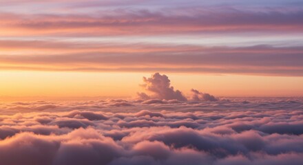 Sunrise above a sea of clouds
