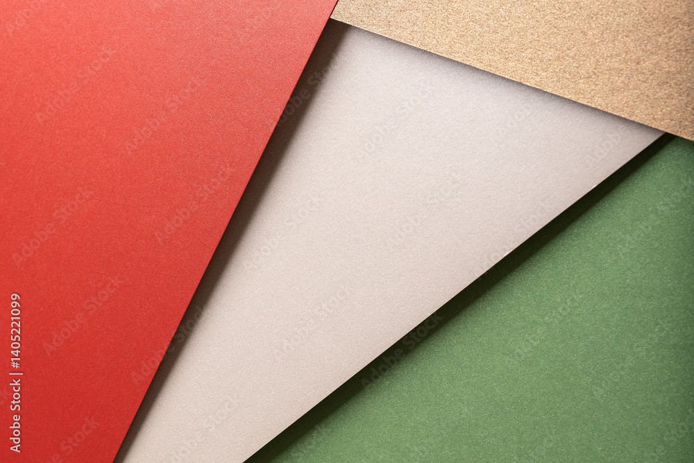 Aufkleber paper background with matte texture. layered diagonal sheets in bright red, champagne, metallic brow