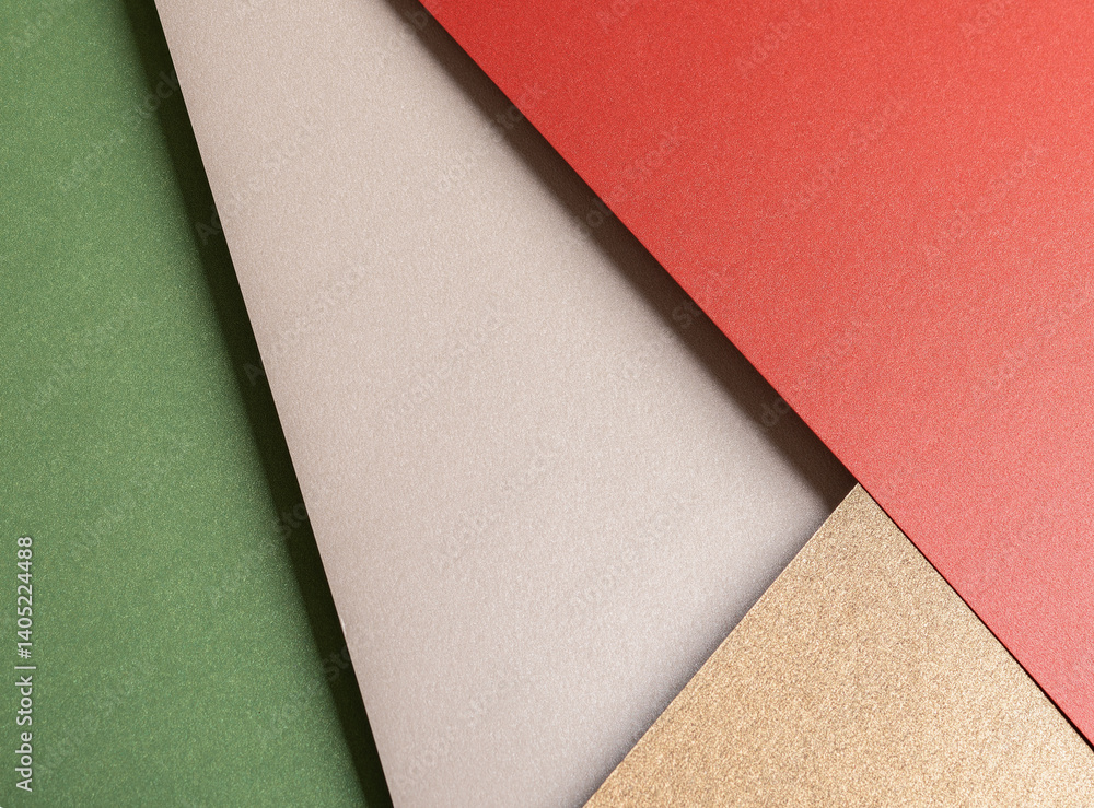 Aufkleber paper background with matte texture. layered diagonal sheets in crimson red, champagne, soft beige, 