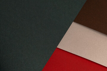 Paper background with matte texture. Layered diagonal surface in crimson red, champagne, chocolate...