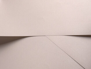 Paper background with satin pearlescent texture. Folded matte surface, angular overlap, smooth...
