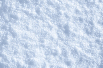 Fresh sparkling hilly uneven tuberous snow close-up, perfect as a winter season background texture
