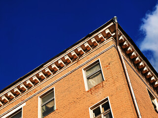 Corner of the red bricked building architecture background