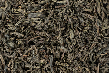 Dark and Twisted Ruhunu Tea Leaves. Pure Ceylon Tea Macro