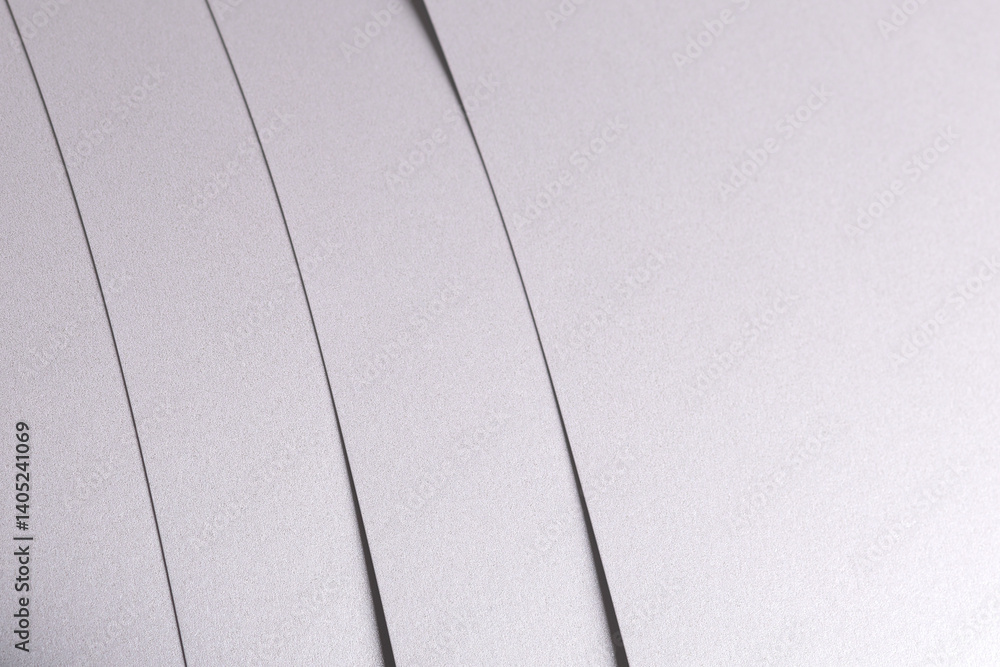 Aufkleber white satin paper background with a glossy, smooth texture and layered strips. pale grey and icy sil