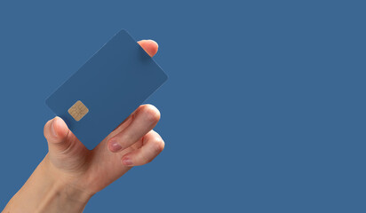 Credit card held in hand, symbolizing cashless payment, financial transactions, and banking....