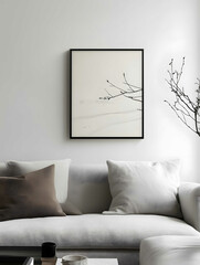 modern small wall art frame hanging on a white wall in a minimalist living room